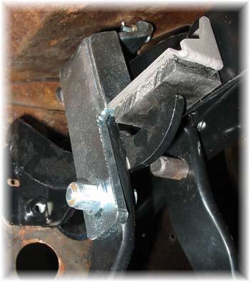 (For automatic to stick conversion skip this step) 13. Bolt on the bracket to clutch pedal.