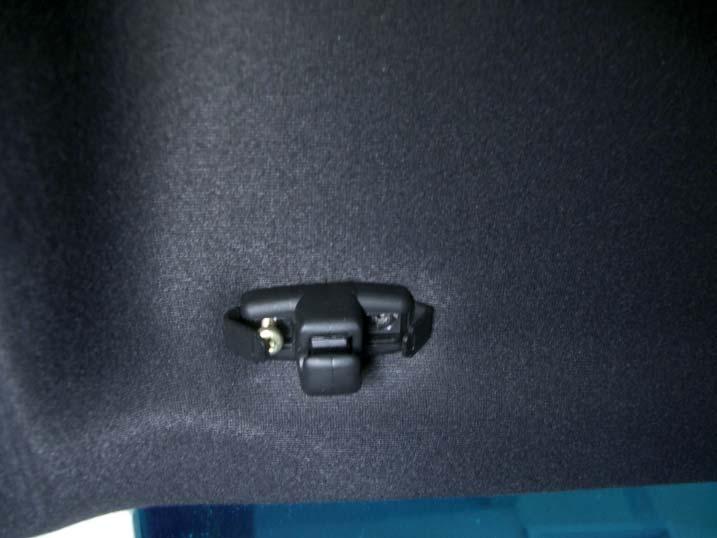 2 Remove the passenger and driver side sun visor mounting clips.
