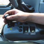 Front loaders can be connected to allow them to be controlled by the armrest joystick. This saves space and money, as separate hydraulics and controls are not needed for the loader.