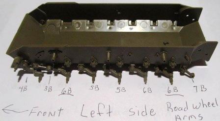 Photo 15 shows the CORRECT placement of the road wheel arms on the right side the (2) underlined {#17B} s are omitted or poorly identified on the instruction sheet.