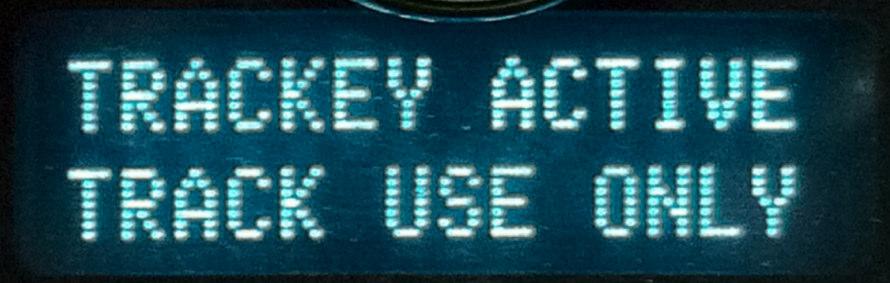 USING TRACKEY: When the car is started with the TracKey, the message center in the instrument cluster will display "TRACKEY ACTIVE TRACK USE ONLY" as shown below: 2012 2013 At this point all TracKey