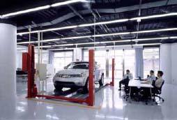 collaboration room with a car lift by