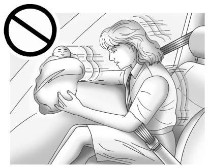 Seats and Restraints 3-39 { WARNING Never do this. Never hold an infant or a child while riding in a vehicle.