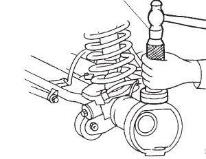 13. Install the supplied new king-pin bearing caps and bearing plugs with a suitable driver. Fig 12 14.