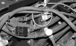 Inside the engine room, loop any excess wire harness (#) around power cords and/or hydraulic hoses near the connection point.. Connect wire harness (#) to wire harness (#).