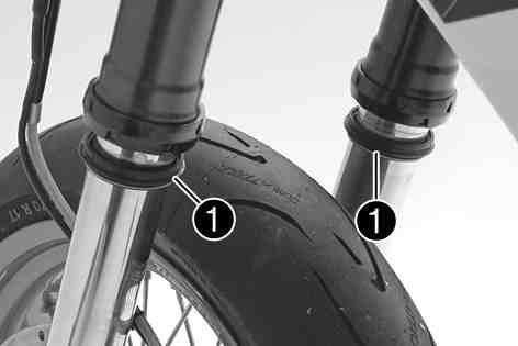 67) Remove the fork protector. ( p. 72) Main work Push dust boots1on both fork legs downward. The dust boots remove dust and coarse dirt particles from the inside fork tubes.