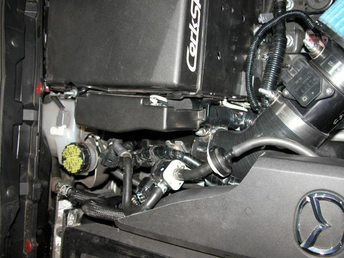 car and remove it f) Remove the valve cover breather tube connected to the factory rubber intake elbow