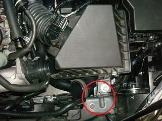 (TMIC) by removing the two 10mm bolts b) Disconnect the MAF housing sensor located on the air box (shown in