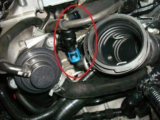 the air box (shown in red circle in Figure 1a) d) Remove the two 10mm bolts on the air box bracket and remove