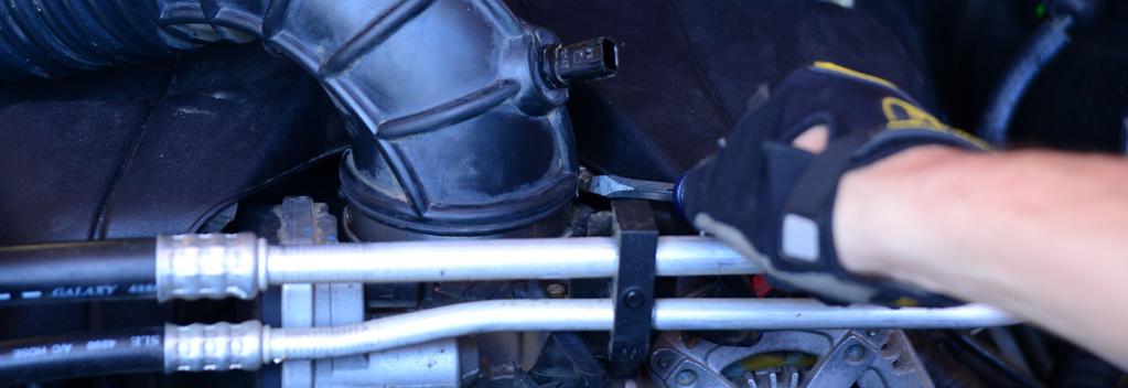 3. Loosen the band clamps at throttle body.