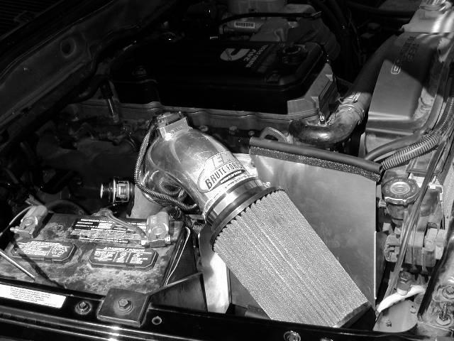 a) Inspect the engine bay for any loose tools and check that all fasteners that were moved or removed are properly tight.