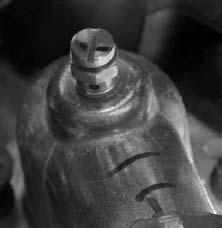 4. After the engine cools, open the coolant air bleed valve. There is one bleed valve. It is located on the thermostat housing. 5.