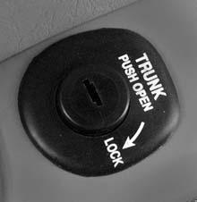 Trunk {CAUTION: It can be dangerous to drive with the trunk lid open because carbon monoxide (CO) gas can come into your vehicle. You can t see or smell CO.