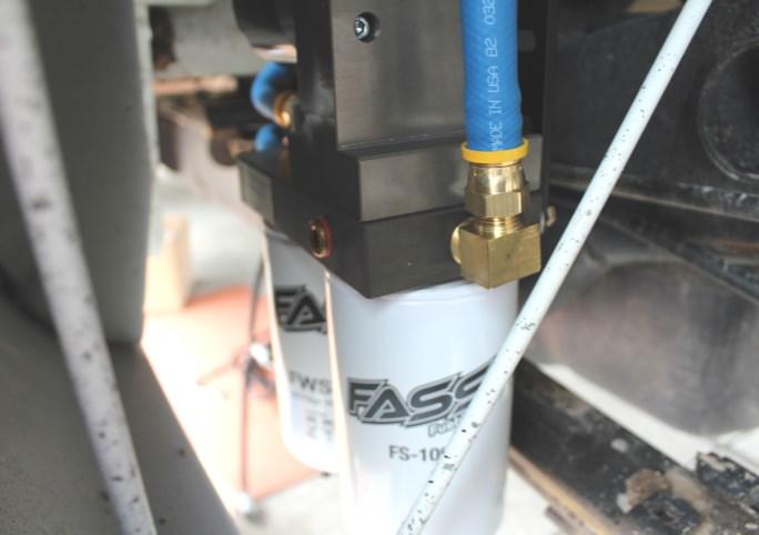 Caution: Do not use sealant on AN fittings. Only use sealant on threads going into the FASS pump. A. Route suction line to T port.