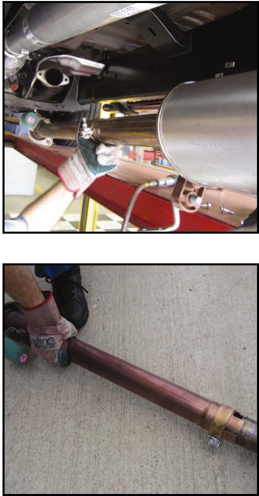 D & E) Carefully remove the entire stock exhaust system from the vehicle by moving it forward and down past