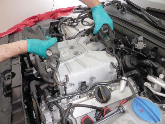 Clean around the supercharger with com- pressed air BEFORE lifting to prevent debris from falling into the ports.