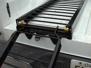 If the Ramp Gate Pin fails to snap down and lock, simply adjust the ramp until this is achieved. THE RAMP MUST BE LOCKED IN THIS POSITION AT ALL TIMES. 8.