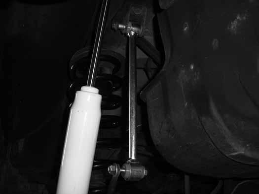 Figure 19 16. Reattach the brake line to the driver's side of the upper control arm using the original hardware.