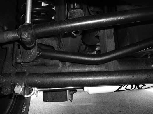 21. Locate the new adjustable track bar, track bar bushings and sleeves (0.750 x 0.134 x 1.575). Grease and install the bushings and sleeves in each end of the track bar.