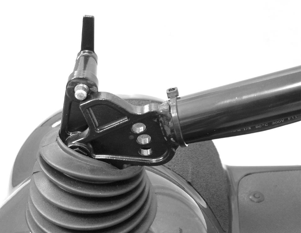 SECTION 8 TILLER ADJUSTMENT SECTION 8 TILLER ADJUSTMENT Adjusting the Tiller Angle WARNING Before performing any maintenance, adjustment or service, turn power Off and remove key from ignition.