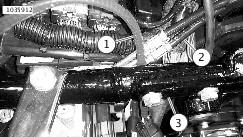 If there is contact between the O2 sensor body and transmission cover, install a couple of washers or a spacer under the mid frame exhaust clamp. Up to 0.200 in of spacer is acceptable.