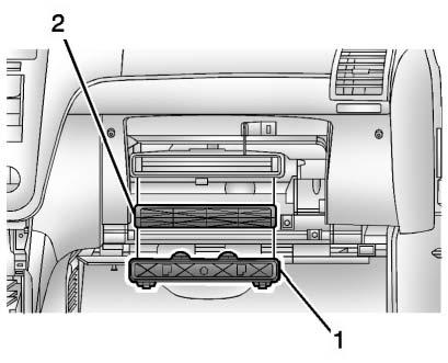 To find out what type of replacement filter to use, see Maintenance Replacement Parts on page 11-13. 1. Open the glove box. 2. Twist the compartment retainers (1) and pull outward to remove. 3.