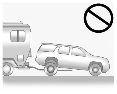 10-74 Vehicle Care { Caution Towing the vehicle from the rear could damage it. Also, repairs would not be covered by the vehicle warranty. Never have the vehicle towed from the rear.