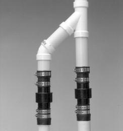 Attach an L bracket to the discharge pipe of the main AC pump with two (2) stainless steel L BRACKET hose clamps.