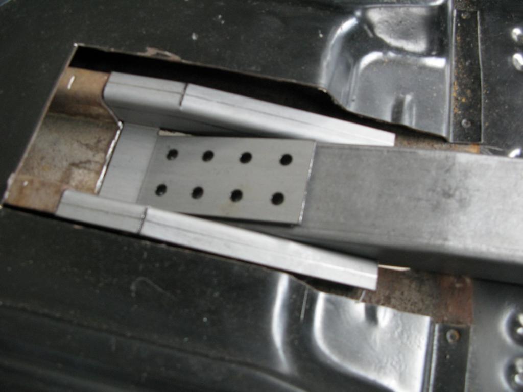 Figure 9 2. Position the seat riser section cut-out earlier and trim to fit over the newly installed subframe connector.