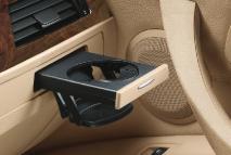Power sunshade for the rear window can be raised and lowered at the press of a button.