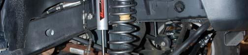 Install the new coil spring in the stock location with the factory isolator as shown See Photo 3. 7. Install the new Rough Country Performance 2.
