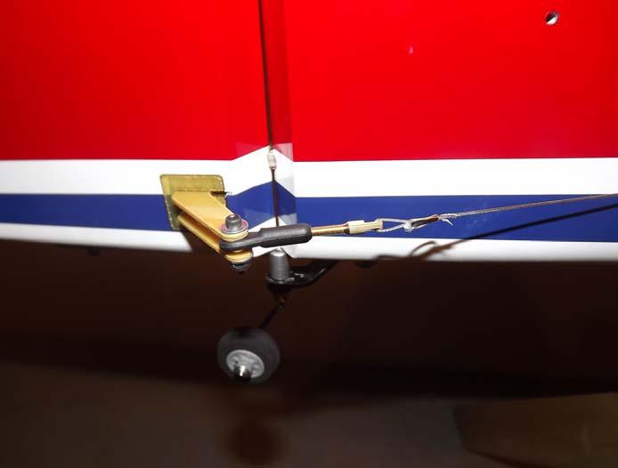 39. Insert the bare end of the cable into the slot in the rear of the fuselage and feed it forward into the canopy