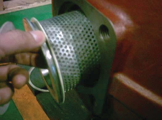 Put suction filter inner gasket on motor casing suction flange before installing suction