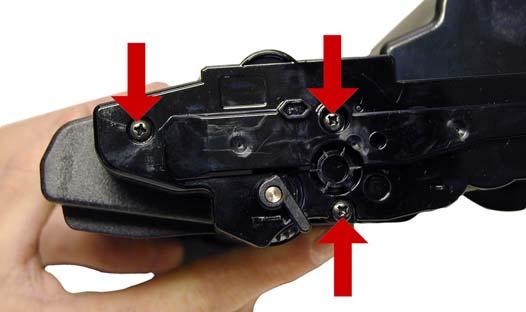 See Figure 5 2) Gently pry off plastic drum axle bushing.