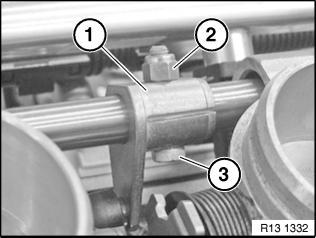 Note: In order to ensure correct throttle valve setting, you must slacken all the screw connections on the actuating levers with the actuating shaft except at throttle valve assemblies 5 and 6.