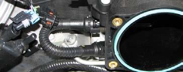 Use a 3/8 Fuel Line Removal Tool to disconnect the fuel line from the fuel rails and from the