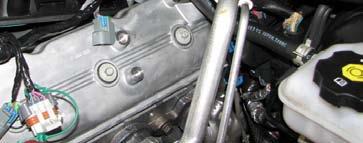 forward and set them aside. 30. Use an 8mm socket to remove the nine remaining manifold bolts.