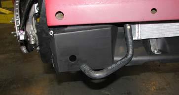 Use the supplied bolt and a 13mm socket to secure the water pump by tightening the strap to the bracket. 94.