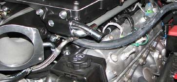 122. Connect the supplied Fuel Rail Crossover line with the 90 fittings to the passenger side fuel rail.