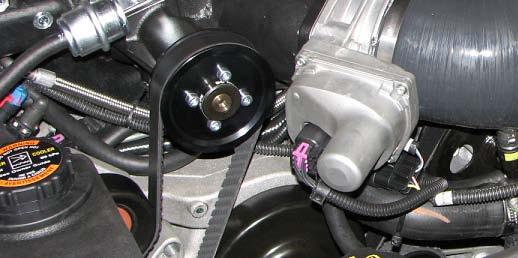 body connector on the throttle body. 135. Connect the Intercooler Hose Assembly to the rear facing driver side fitting and the side facing passenger side fitting.