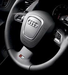 Sport steering wheel with shift paddles The three-spoke, leather-wrapped design has a sporty