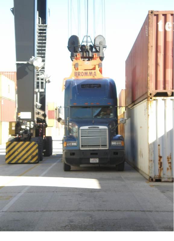 5.4.6. Drivers can lock chassis twist locks immediately after the containers are loaded, as described in 5.9, Pedestrians. 5.4.7. Use caution around any suspended load.