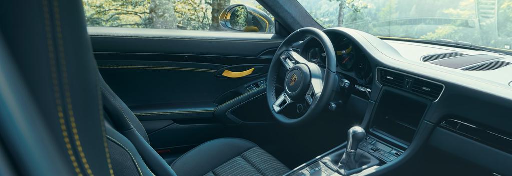 Interior design. Are you sitting comfortably? That's exactly our intention. Every component, every switch and every bit of padding in a 911 is tailor-made for sporty driving. And for you.