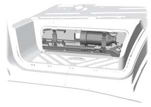 The jack, wheel brace and jack handle are located in a storage compartment in the front right stepwell.