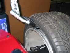 8.3_ Bead breaking of standard tyres Before performing any operation, make always sure that the tyre is deflated Grease the tyre edges by means of