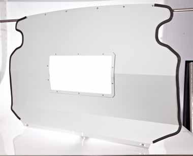 Window bulkhead incorporating a clear high performance polycarbonate sheet for vision.