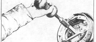 FIGURE 9 6. Remove bearing from axle shaft, using bearing remover J-358 - H - 1 Holder and J-2641 Adapter, Figure 10. FIGURE 8 3.