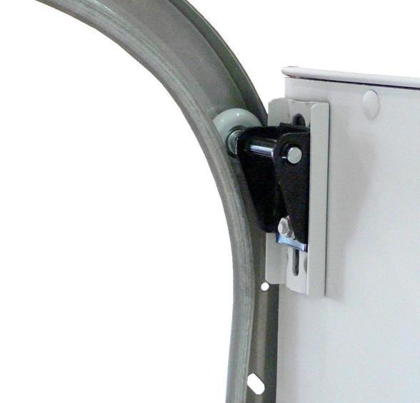 WHITING DryFREIGHT style roll-up doors come equipped with regular top closure assemblies (shown to the right).