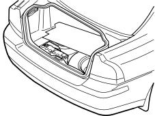 Fold the front half back over the rear half of the cargo compartment carpet.