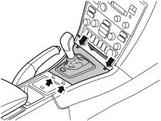 M3902614 6 Pry off the panel in front of the gear selector lever. Use a weatherstrip tool as illustrated.